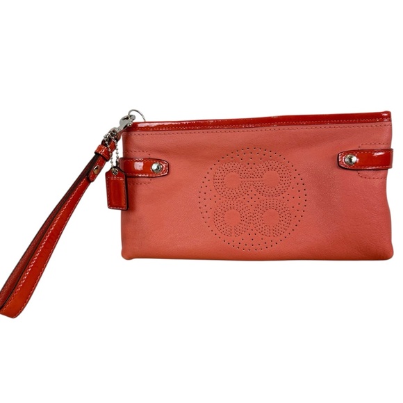 Coach | Orange Punch-Out Pattern Wristlet - Picture 1 of 13